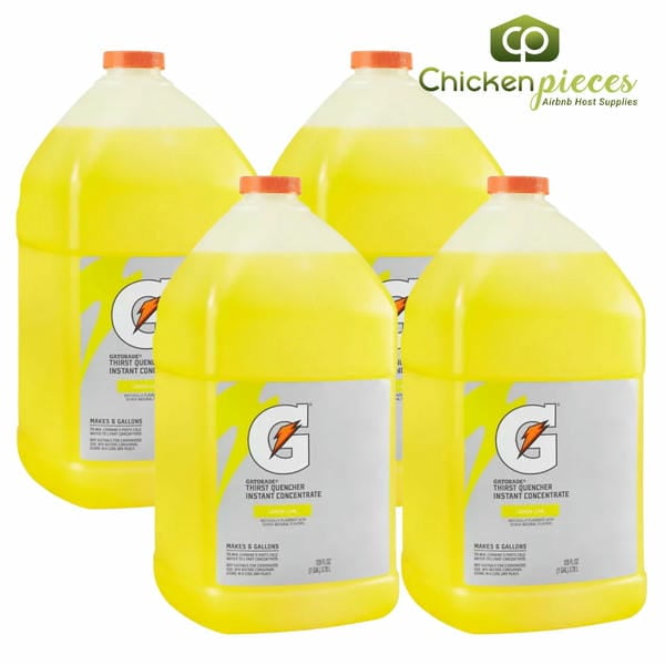 Four 1-gallon containers of Gatorade Lemon/Lime Concentrate, designed for instant mixing. Each container can make up to 6 gallons of beverage, with a total yield of 24 gallons per case. The containers are bright yellow with orange caps and feature the Gatorade logo on the label.