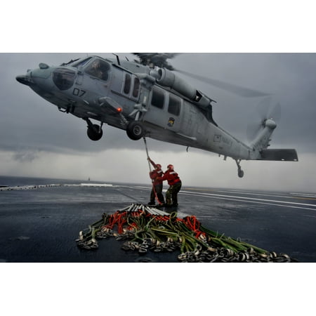 LAMINATED POSTER Sailors conduct an at-sea ammunition on-load aboard the aircraft carrier USS George Washington (CVN Poster Print 24 x
