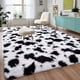 thumbnail image 1 of Alfombra DweIke 152x244 cm de Peluche Suave Estampado de Vaca en Blanco y Negro, 1 of 9