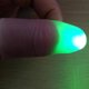 thumbnail image 1 of Luces de dedos parpadeantes, 2 pares, accesorios de trucos de magia con luz LED para niños, juguetes fantásticos y asombrosos que brillan, 1 of 6