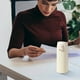 thumbnail image 5 of Vaso de agua portátil y moderno de acero inoxidable para hombres y mujeres con asa y tapa de rebote, taza aislante de 320 ml., 5 of 7