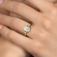 thumbnail image 4 of Gem Stone King 10K Yellow Gold Simulated White Opal and Green Peridot Engagement Ring for Women | 1.60 Cttw | Oval Cabochon 9X7MM | Gemstone October Birthstone | Size 5, 4 of 6