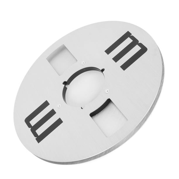 Une Bobine De Bande Magnétique Et Une Disquette Utilisée Dans Le Calcul Pour Le Stockage 25826048
