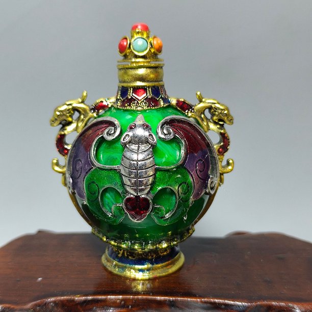 Antique-style snuff bottle, crafted from alloy and inlaid with moonstone, is a decorative item.