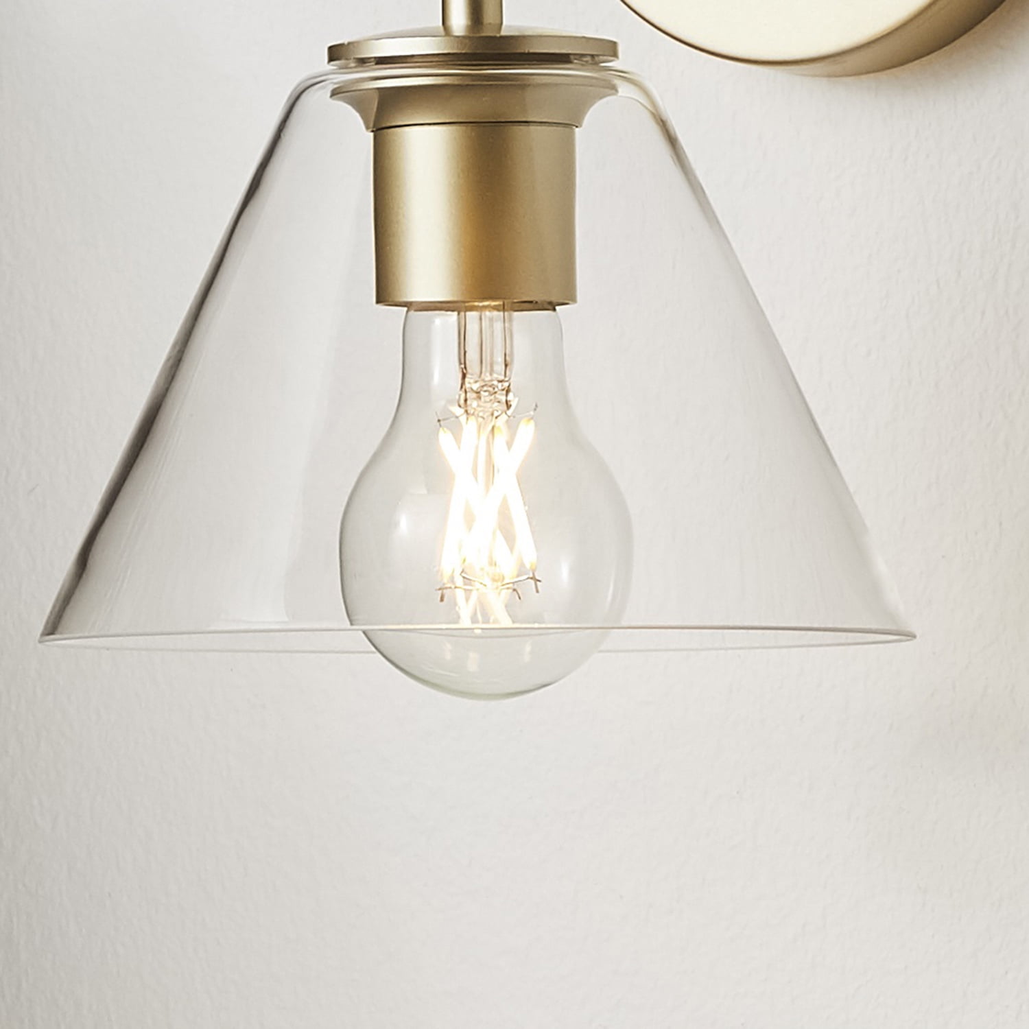 Better Homes & Gardens Clear Glass Wall Sconce, Burnished Brass, 1 Dimmable A19 LED Bulb Included
