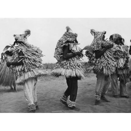 Native dancers wearing costumes and dancing Benin Canvas Art - (18 x 24)