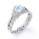 thumbnail image 4 of JeenMata Anillo Nupcial de 1,5 Quilates con Piedra Lunar Arcoíris Facetada Redonda y Moissanita con Cuerpo Dividido Engastado en Oro Blanco de 18 K sobre Plata, 4 of 6