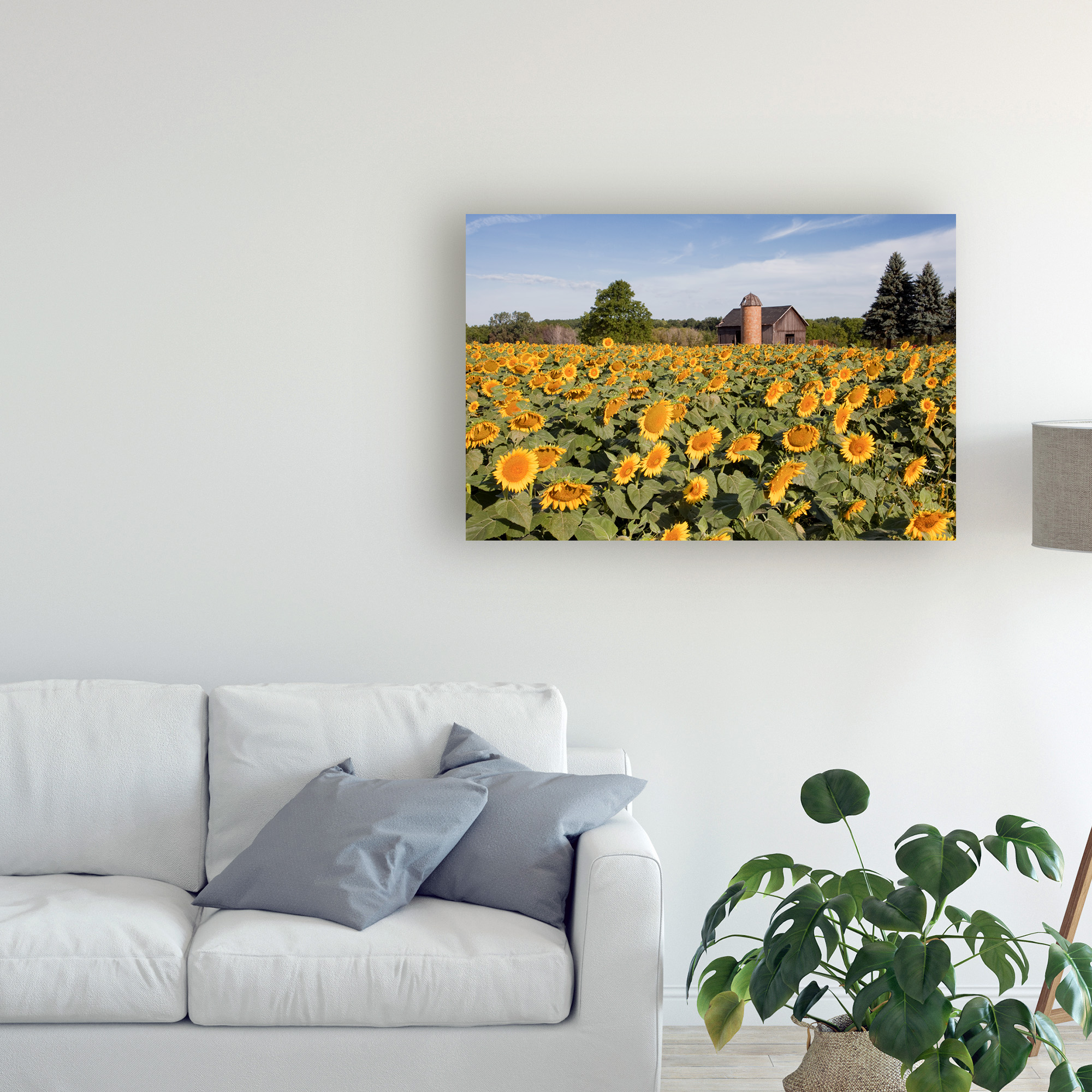 Trademark Fine Art 'Sunflowers And Barn Owosso Mi' Canvas Art by Monte Nagler