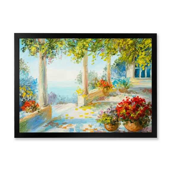 Designart 'Terrace With Red Flowers Near The Sea' Nautical & Coastal Framed Art Print