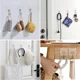 thumbnail image 2 of Ganchos de pared autoadhesivos de gran tamaño, ganchos impermeables transparentes resistentes de 22 libras para organizador de almacenamiento de cocina y baño, 2 of 5
