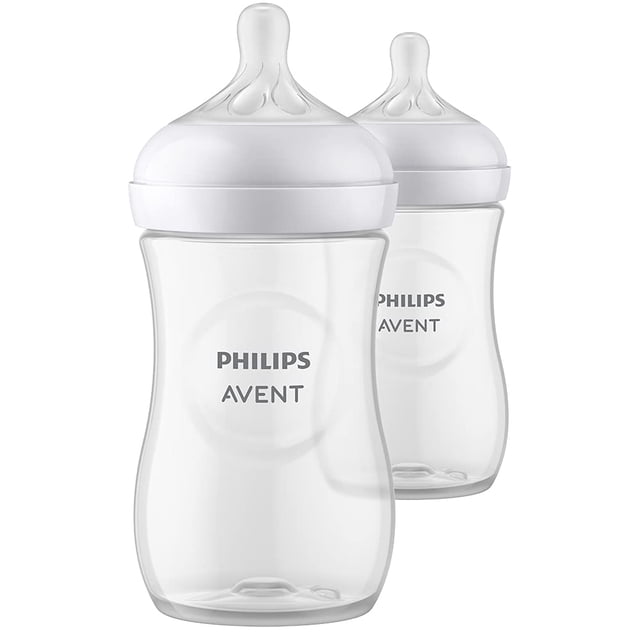 philips avent biberón natural con tetina de respuesta natural n Paquete de 2 biberones transparentes de 270 ml con tetina Natural Response flujo 3; vista frontal centrada, silueta curvada y tetina ancha en forma de seno que facilita combinar con lactancia materna, tapa blanca y logotipo Philips AVENT impreso.