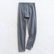 thumbnail image 1 of Pantalones de dormir de color liso a la moda para hombre, pantalones cortos holgados, pijamas largos, pijamas de poliéster para hombre., 1 of 3
