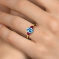 thumbnail image 4 of Gem Stone King 2.00 Ct Oval Swiss Blue Topaz Red Created Ruby 18K Yellow Gold Plated Silver Ring, 4 of 6