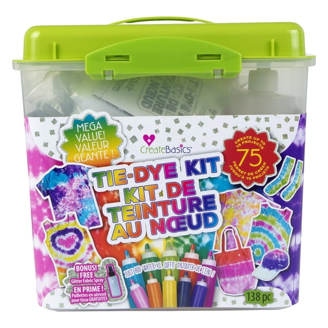 Create Basics Tie Dye Party Mega Value Tub with Bonus Glitter Spray, clear plastic storage bin with lime green lid, containing 10 no-mess multicolour dye bottles, 12 pairs of gloves, 100 rubber bands, surface cover, and project guide, suitable for up to 75 tie-dye projects on natural fiber fabrics like cotton, shown with tie-dye shirt, tote bag, socks, and cap illustrations on the label.