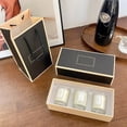 thumbnail image 4 of Xihbxyly Juego de 3 Velas Aromáticas, Elegante Caja de Regalo Navideña, Acogedor Ambiente Interior, Decoración Festiva para El Hogar, Ideal para Regalar, Tamaño 25 X 9 X 6 Cm., 4 of 6