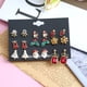 thumbnail image 1 of Fiudx Colgantes Navideños, Dulces Festividades, Elegantes Copos de Nieve, Divertidos Dijes Papá Noel, Ideal para Regal En Navidad, Ropa de Fiesta para Mujer, Set Variado de 9 Pares., 1 of 6