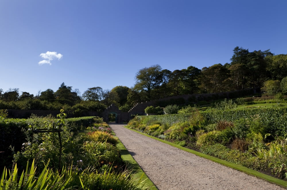 The Victorian Walled Garden Kylemore Abbey Connemara County Galway Ireland Built in 1870 it fell into neglect and was re-opened in 1999 winning the prestigious Europa Nostra Award in 2002 Canvas Art -