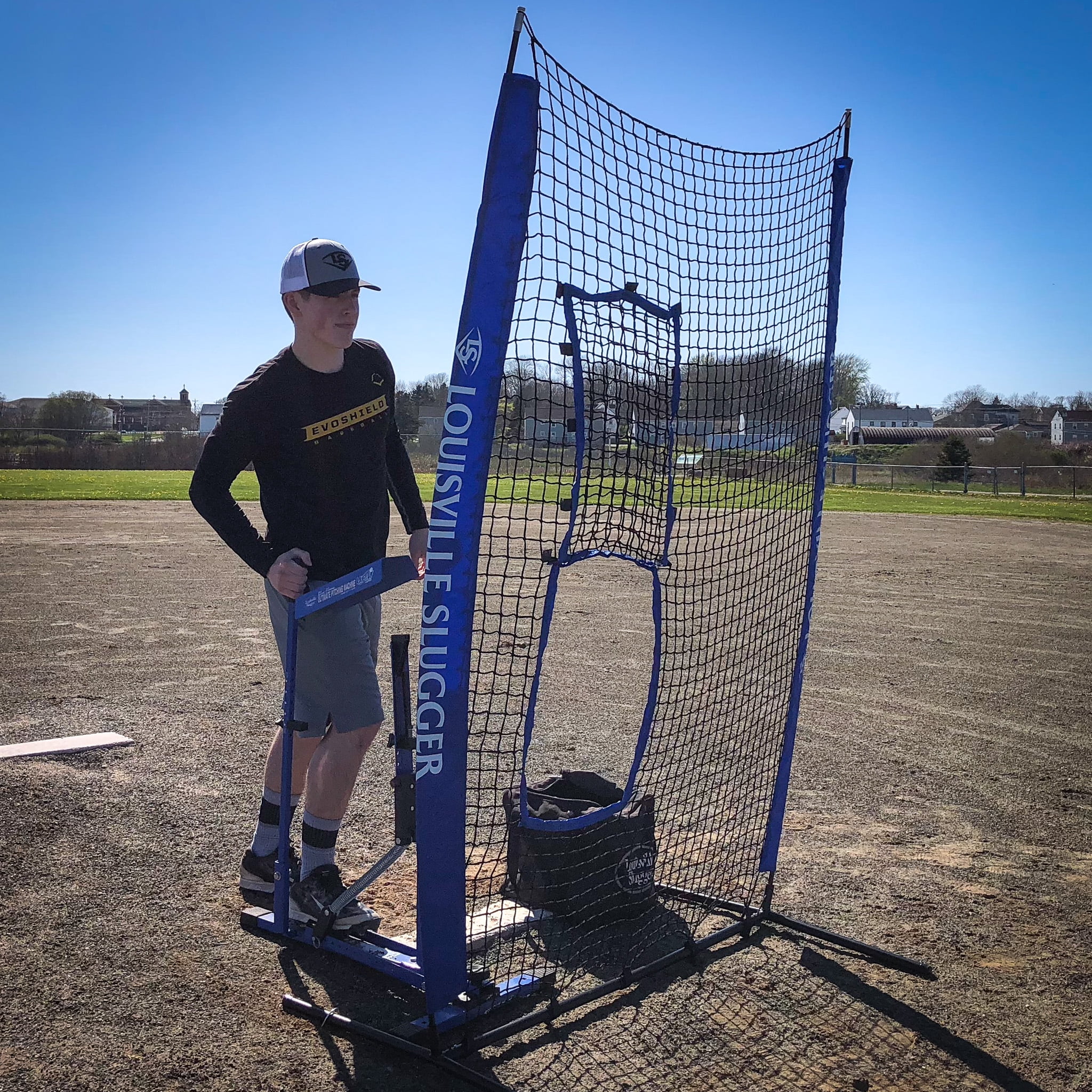 Louisville Slugger Blue Flame Pitching Machine – Manual Baseball & Softball Trainer, Throws Up to 60 MPH, Youth & Adult Practice Tool