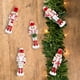 thumbnail image 4 of Set 5 Cascanueces De Madera 13cm Blanco Y Rojo Navideños, 4 of 5