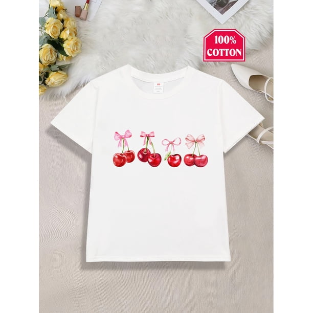 Adorable camiseta para niña con estampado de cerezas. 100 % algodón. Cómoda camiseta de manga corta con cuello redondo y detalle de lazo rosa. Perfecta para primavera/verano. Regalo ideal para niñas