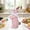 Pink-PK Home Decor, variant on karymi Resin Easter Bunny Figurine with Woven Rattan Effect and Bow Detail 8.18x4.80x3.26in Decorative Tabletop Ornament for Spring Home Fireplace Mantel Decor Party Favors Gifts for Men
