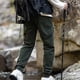 thumbnail image 4 of Pantalones largos de moda para hombre, casuales, de color sólido, con bolsillos y cremallera, cintura elástica, de poliéster., 4 of 8