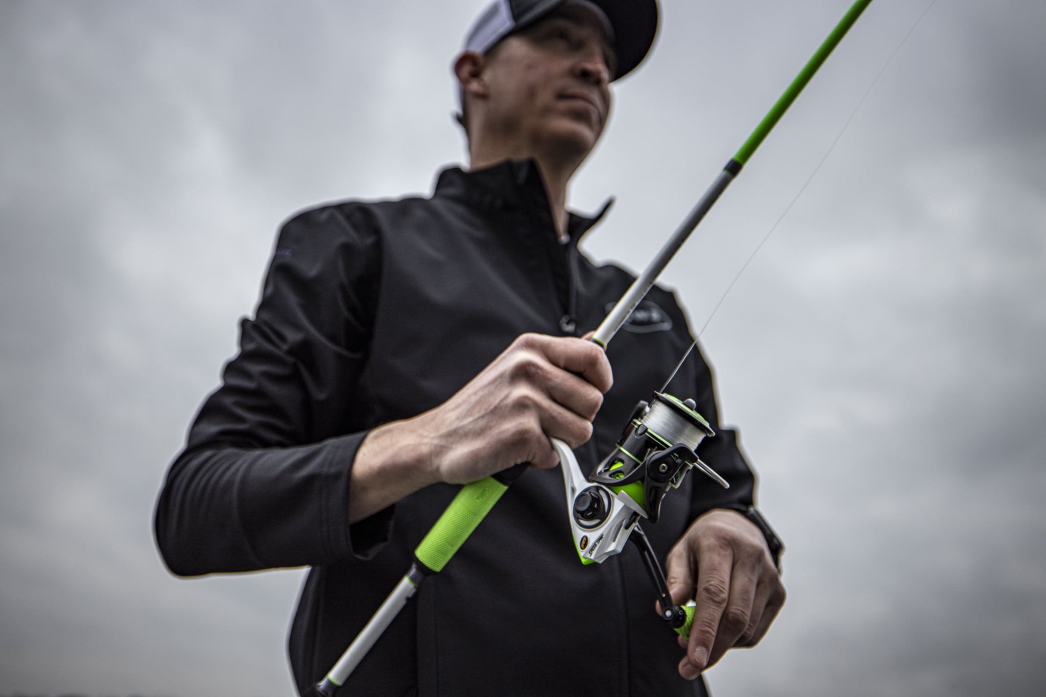 Lew's Xfinity Spinning Combo features a 6-foot 6-inch spinning rod with a  split-grip rod handle. Features a bold greene and black color combination.  