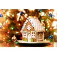 thumbnail image 1 of Homemade Christmas Gingerbread House Displayed on a Table Christmas Tree Lights in the Background, Unframed Photographic Print Wall Art by Leena Robinson Sold by ArtCom, 1 of 4