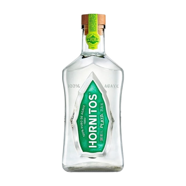 tequila hornitos plata 1 l botella frontal de vidrio transparente con etiqueta verde en relieve y tapón de corcho; grabado '100% agave' en el vidrio, elaborado en barricas de roble blanco y presenta notas herbales, cítricas y florales, ideal para cenas navideñas.
