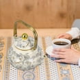 thumbnail image 5 of Vintage Floral Enamel Tea Kettle, Stovetop Safe Steel Teapot with Gold-Tone Dragonfly Handle, Colorful Porcelain Finish for Home Kitchen Decor and Gift,A,52oz, 5 of 5