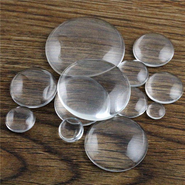 6 mm 8 mm 10 mm 12 mm 14 mm 16 mm 18 mm 20 mm 25 mm 30 mm 35 mm Cabujón de vidrio transparente con parte posterior plana redonda, alta calidad, promoción al por mayor Tan Jianjun unisex
