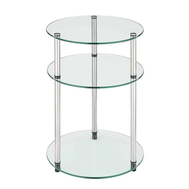 Convenience Concepts Classic Clear Glass Three Tier Round Table featuring a modern design with three round tempered glass shelves supported by stainless steel clad poles. The table measures 24.5 inches in height and 15.75 inches in diameter, making it suitable for living rooms, bedrooms, or bathrooms. The stainless steel poles are rust-resistant, and the table requires no tools for assembly.