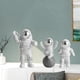 thumbnail image 5 of Figura de acción de astronauta (3 piezas), adorno para estante de mueble de sala de estar. Plata, 5 of 9