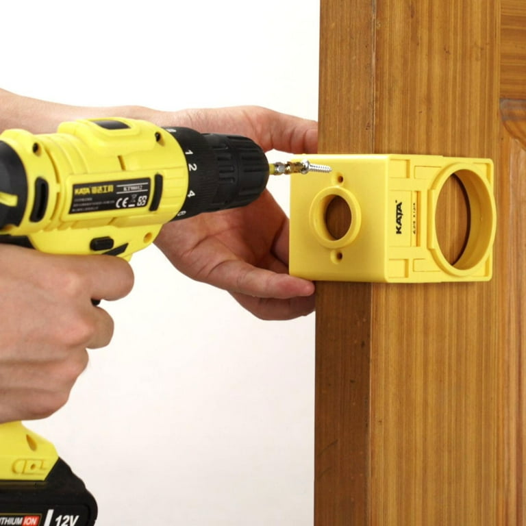 Door lock drill guide outlet