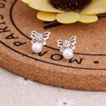 thumbnail image 4 of Pendientes de botón para estudiantes femeninas, estilo coreano, personalidad simple, temperamento, lindas joyas para las orejas antialérgicas, pendientes de moda que combinan con todo, 4 of 6