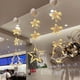 thumbnail image 5 of Lámpara de ventosa navideña con forma de estrella y luna LED, adornos navideños para el hogar, bodas, fiestas, adornos colgantes para ventanas, regalos de Navidad y Año Nuevo, 5 of 5