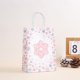 thumbnail image 4 of Bolsa De Regalo Con Motivos Navideños Bolsa De Papel Kraft Con Estampado Invernal Para Enviar A Tu Novia Bufanda, Guantes Y Bolsa, 4 of 7