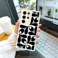 thumbnail image 3 of Mejore la apariencia de su iPhone con un vibrante diseño de dibujos animados y una funda plateada mate de doble capa para teléfono, 3 of 4