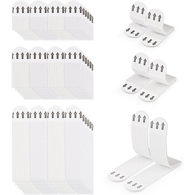 36 pares (72 tiras) de lengüetas para colgar cuadros sin perforaciones, set en tres tamaños dispuestos en filas; tiras adhesivas blancas de poliéster y nailon con textura rugosa, lados de gancho y anillo visibles y flechas negras que señalan dirección de extracción, vistas de tiras dobladas; aptas para colgar marcos, espejos pequeños y decoraciones en superficies lisas.