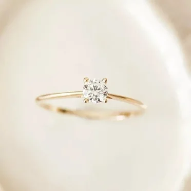 Women's 1Ct Round Cut Lab Created White Diamond Solitaire Ring in 14K Yellow Gold Plated
