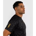 thumbnail image 4 of Venum x Ilia Topuria Unmatched Dry-Tech Shirt - Black/Gold - Medium, 4 of 5