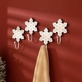 thumbnail image 1 of Ganchos de pared Weysat de madera con forma de copo de nieve blanco, 4 unidades, 10 x 16 cm, 1 of 6