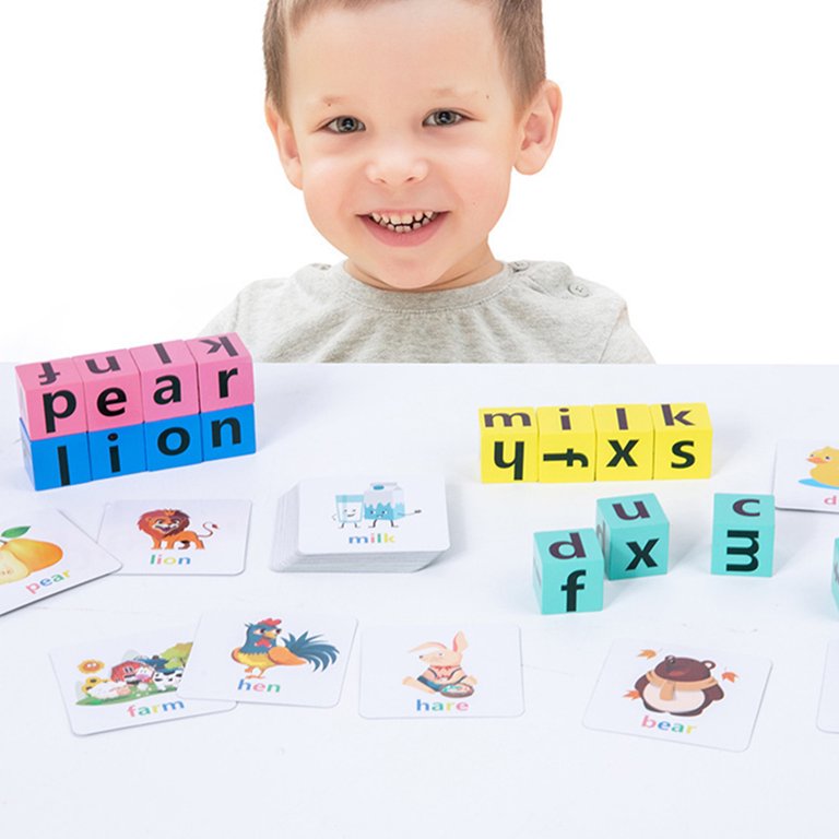 Boy Building Blocks Spelling