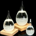 thumbnail image 4 of Storm Glass Weather Predict Glass Ball with Base Ornament For Home Decor,Drop Shaped Weather Storm Glass Crystal Glass Ball Decor,Great Festival Christmas Gift,Home Table Room Bookshelf Decor, 4 of 6