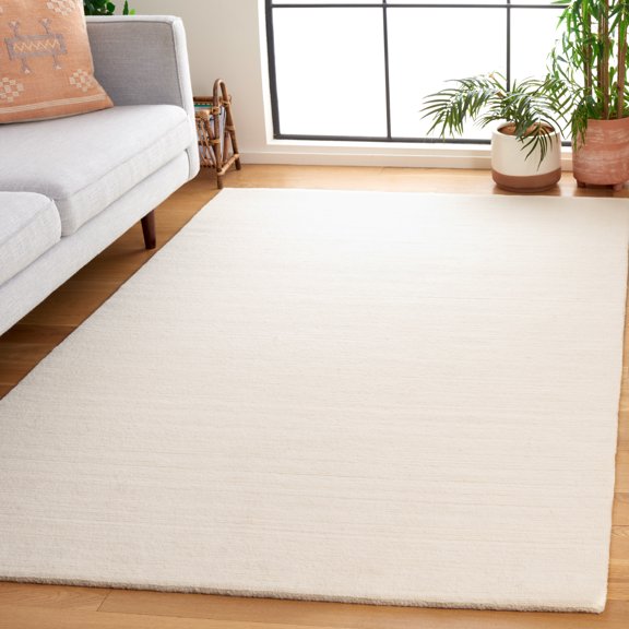 SAFAVIEH Mirage Salome Solid Area Rug, Ivory, 6' x 9'