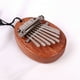 thumbnail image 5 of Fiudx Mini Piano de Pulgar, Diseño de 8 Notas, Fácil de Aprender y Tocar, Teclas Curvas Ergonómicas, Regalo Musical para Familiares y Amigos, Diseño Portátil, Tamaño 8X6X3 Cm, Incluye Llavero y Cuerd, 5 of 7