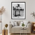 thumbnail image 4 of Historic Framed Print, Perfect form. Marion Mary Fitting, of the Pasedena Athletic Club, clears a hurdle during training for international women's meet at Prague, 17-7/8" x 21-7/8", 4 of 9