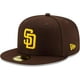 thumbnail image 1 of New Era baseball cap. Yellow "SD" logo on the front. Stylish San Diego Padres cap., 1 of 5