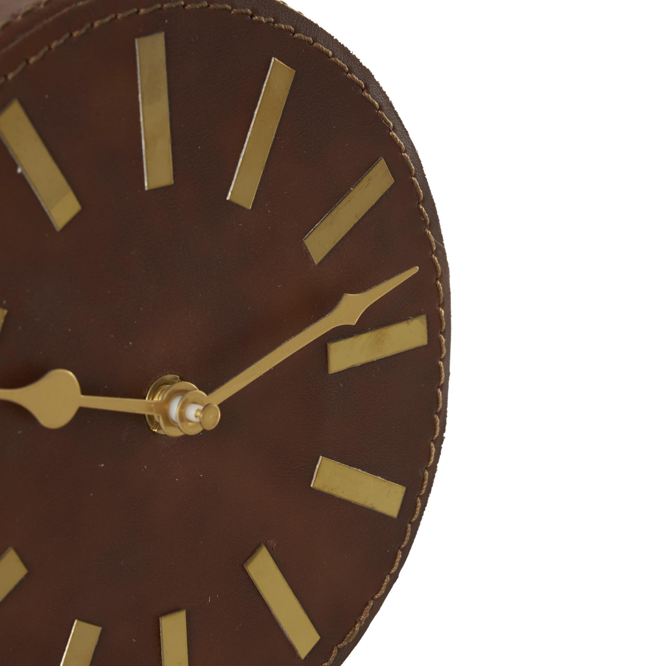 DecMode 7" Brown Faux Leather Round Clock with Gold Rectangular Base