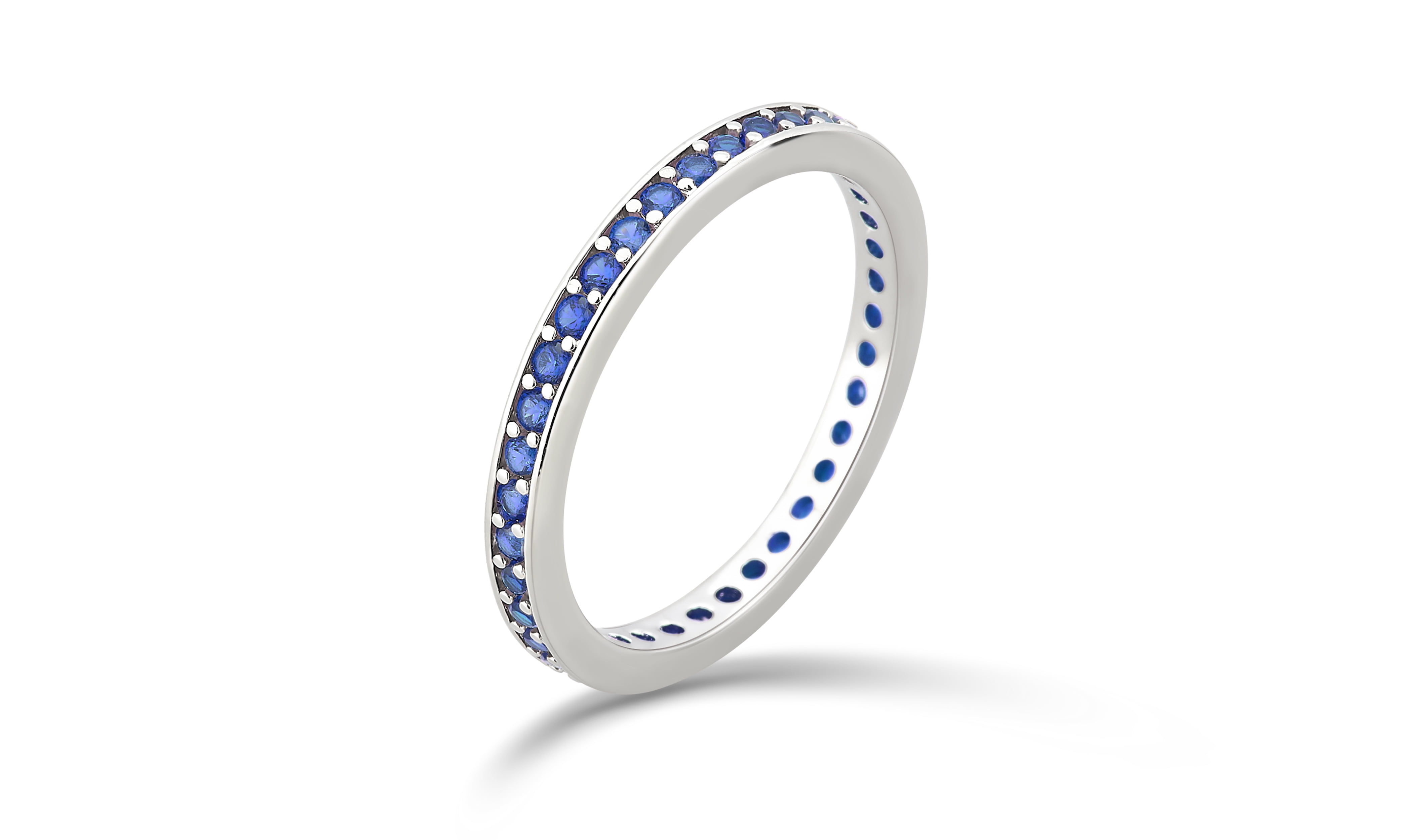 Arista Created Blue Sapphire Eternity Fashion Women's Wedding Band in Silver Overlay Brass